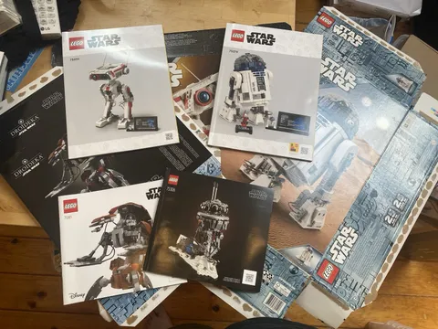 Lot of Star Wars Lego droid boxes and manuals