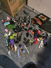 1  1/2lbs Lego Bionicle Misc Bulk Parts With Masks And Weapons 