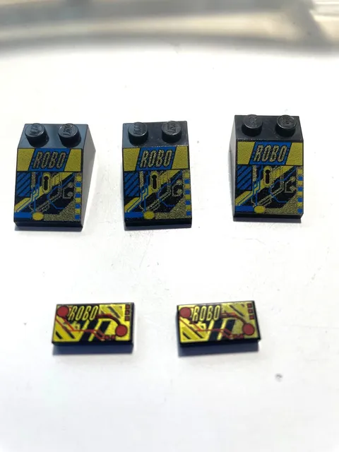 LEGO Three RoboForce Black Slope 33 3x2 & Two Black Tile 1x2 Gold Robo