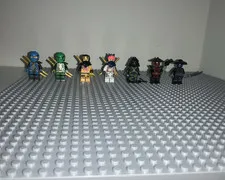 LEGO NINJAGO Ninja Minifigure Lot of 8 w/ Weapons & Accessories