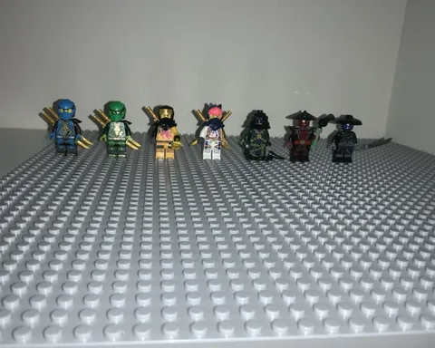 LEGO NINJAGO Ninja Minifigure Lot of 8 w/ Weapons & Accessories