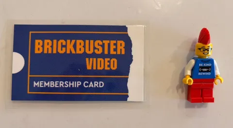 SDCC 2023 LEGO Exclusive Brickbuster Minifigure BE KIND REWIND +Brickbuster Card