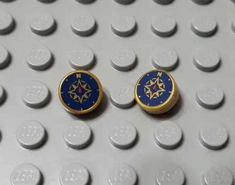 LEGO Lot of 2 Pearl Gold 1x1 Round Tiles Compass Rose and Red Needle