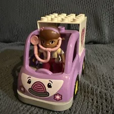 Duplo Purple Vet Dr. DOC MCSTUFFINS Band aid Cross Medical Figure Ambulance A10