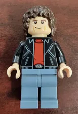 LEGO Minifigure Black Jacket Red Shirt Light Blue Legs Brown Hair Plastic Figure