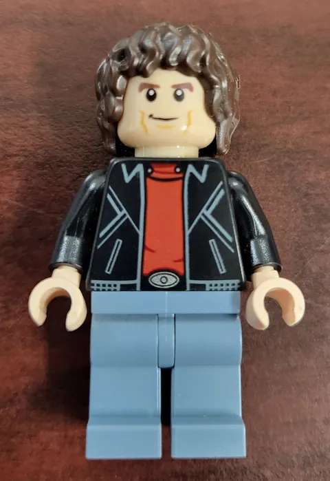 LEGO Minifigure Black Jacket Red Shirt Light Blue Legs Brown Hair Plastic Figure