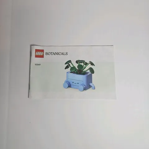 Blue LEGO Botanicals Happy Plants building set number 10349 BOOK ONLY