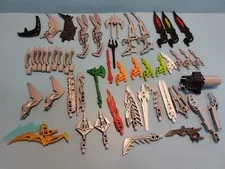 LEGO BIONICLE PARTS MIXED LOT WITH WEAPONS - LOT 4