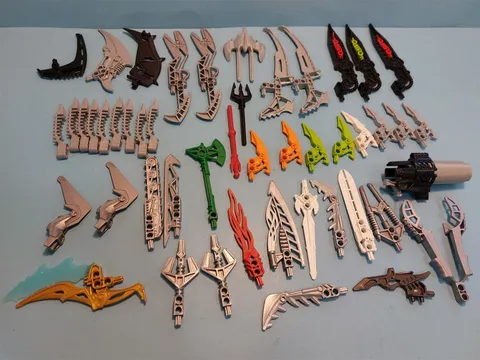 LEGO BIONICLE PARTS MIXED LOT WITH WEAPONS - LOT 4