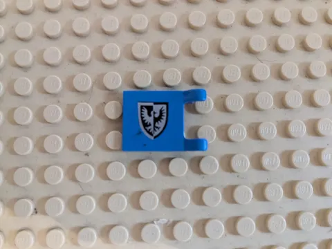 LEGO 6074: 2335p43 Blue Flag 2 x 2 Square Black Falcon Shield (Broken clips)