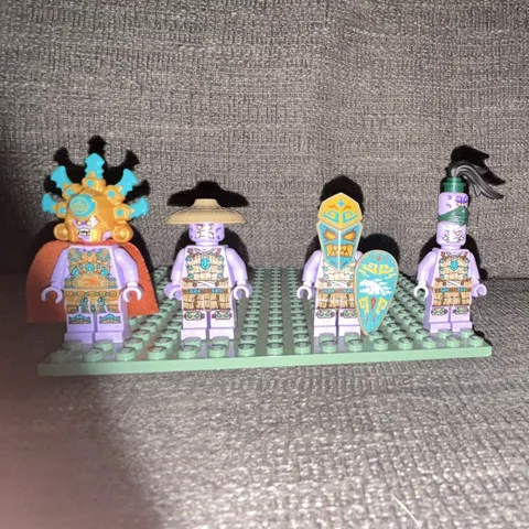 LEGO Minifigure Lot of 4 Purple Figures with Helmets, Shield, Cape & Accessories