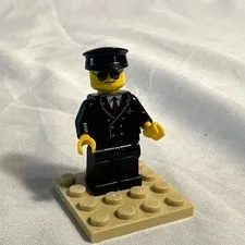 LEGO Classic Town Airline Pilot Black Uniform, Red Tie, With Newer Aviators Head
