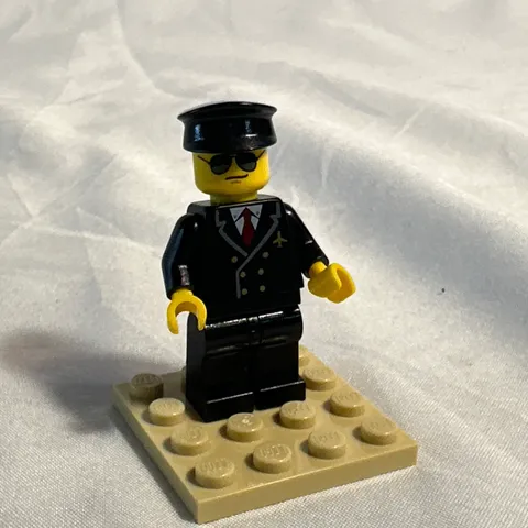 LEGO Classic Town Airline Pilot Black Uniform, Red Tie, With Newer Aviators Head