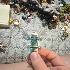 LEGO Minifigure w/ Winged Helmet, White Wing Piece, Trans-Light Blue Armor & Axe