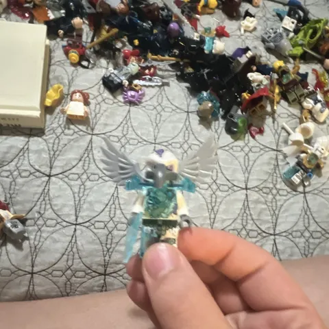 LEGO Minifigure w/ Winged Helmet, White Wing Piece, Trans-Light Blue Armor & Axe