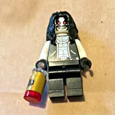 LEGO Minifigure Black Hair Red Eyes Gray Torso Black Legs w/ Canister