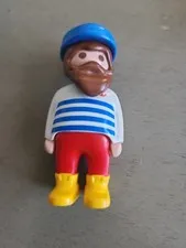 Playmobil Male Figure with Red Pants,White Shirt Blue Stripes, & Blue Cap