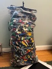 assorted used lego pieces that weighs 20lbs, mostly official lego