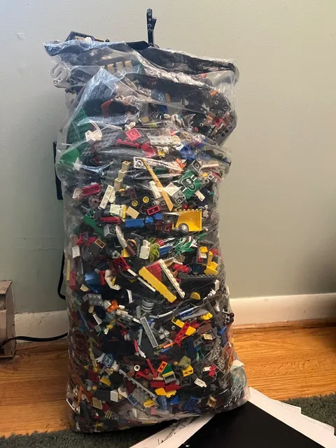 assorted used lego pieces that weighs 20lbs, mostly official lego