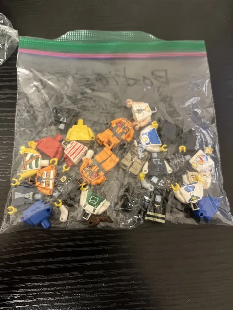 mixed lot of LEGO torso's and legs