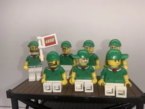 LEGO Mini Figure Set Of 7 On Green Uniform W Hat And White Pants.