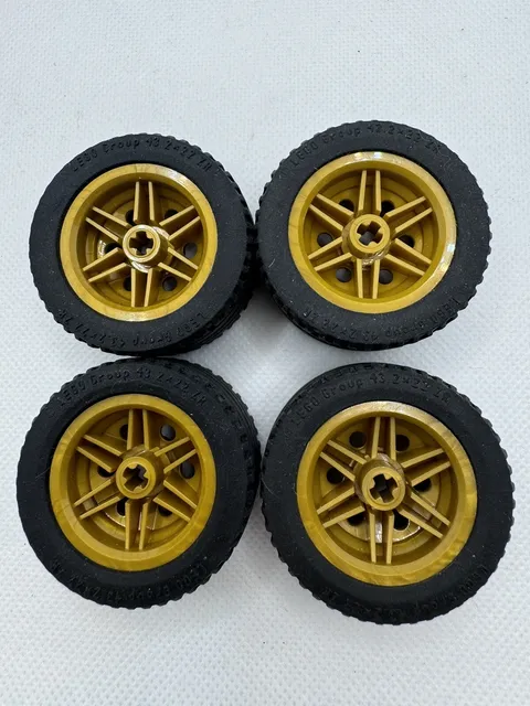 (4) LEGO Wheel Tire Lot- 43.2x22ZR -GOLD RIMS #56145/ 44309 Technic