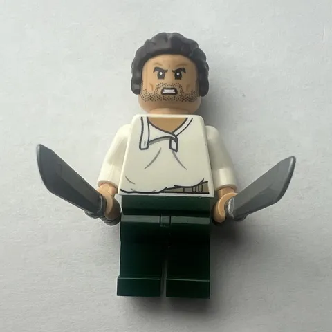 LEGO Minifigure Dark Hair Bun, White Shirt, Dark Green Legs, 2 Silver Knives