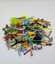 LEGO ® 50x weapons accessories mixed swords spears guns minifigures used