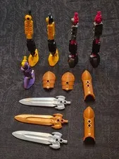 Assorted pieces from the 2004 LEGO Knights' Kingdom II action figure line