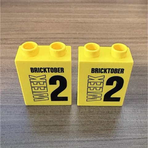 LEGO Bricktober Week 2 Printed Yellow & Blue Bricks & Blocks Lot of 2