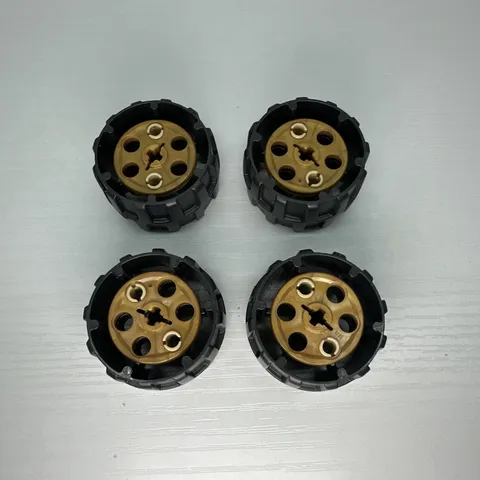 Lego Technic Wheel Hard Plastic, Treaded with 7 Pin Holes Set Of 4 (22410)