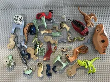 LEGO. Dinosaur and Dragon Parts and Pieces. Approx 11oz. Used.