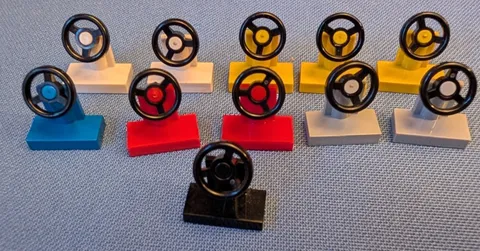 11 Lego pieces bricks parts 1x2 Steering Wheels white yellow blue red gray black