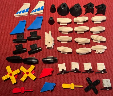 Lego lot of 42 airplane/rocket pieces: propellers, nose cones, jet engines, etc