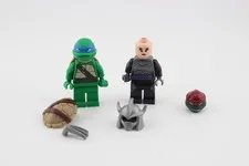 Small lot genuine LEGO TMNT minifigs parts and pieces Leonardo Shredder helmet