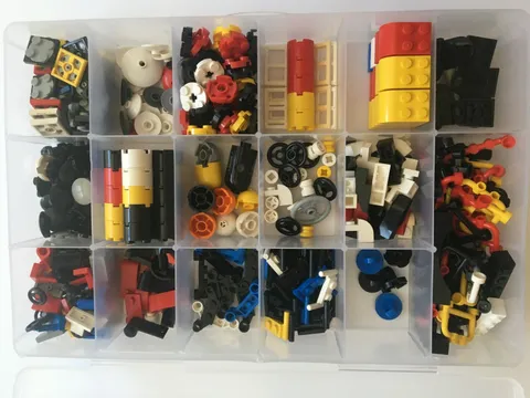 LEGO LOT over 1 lb small unique pieces - primary colors IN STORAGE CASE