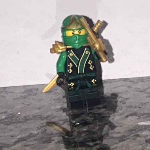 LEGO NINJAGO Lloyd Green Ninja Minifigure with Gold Weapons & Accessories