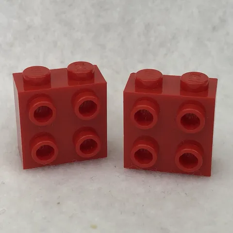 LEGO 22885 Red Brick, Modified 1 x 2 x 1 2/3 with Studs on Side (x2)