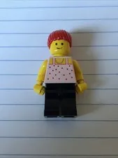 LEGO Girl with Pink Shirt and Red Hair from the 1994 Town Paradisa theme