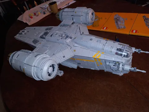 LEGO Star Wars: The Razor Crest (75331),Completed & Millennium Falcon Painting.