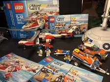 2 Lego sets: City Rescue Helicopter  7903  + coast guard 4wd. 100% complete