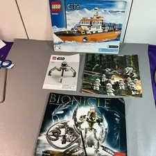 LEGO STAR WARS/OTHERS ASSEMBLY BOOKS. (4) J
