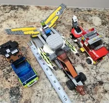 3 prebult lego trucks, block headz and Mini figure one is 11 inches long