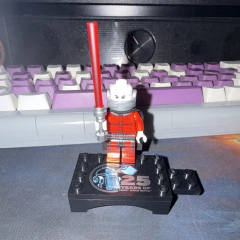 LEGO Star Wars Minifigure w/ Red Lightsaber, Black Cape, 25th Display Stand