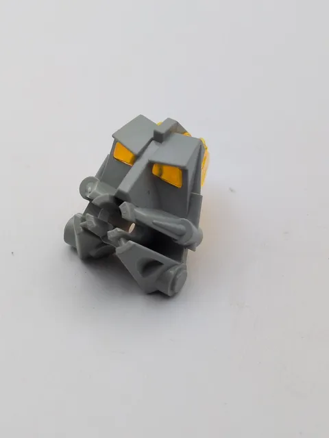 LEGO Bionicle Head Connector Block 32553 with yellow eyes
