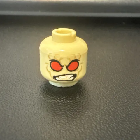 LEGO - Minifig, Head - Red Eyes, Tan Wrinkles, Angry Clenched Teeth / Evil Smile