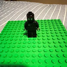 LEGO Minifigure Black Figure w/ Green Face and Red Eyes Plastic