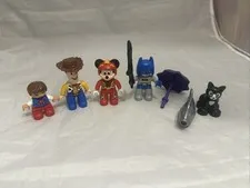 Lot of 4 Lego Duplo Mini Figures Woody Mickey Mouse Batman Kid Umbrella Fish Cat
