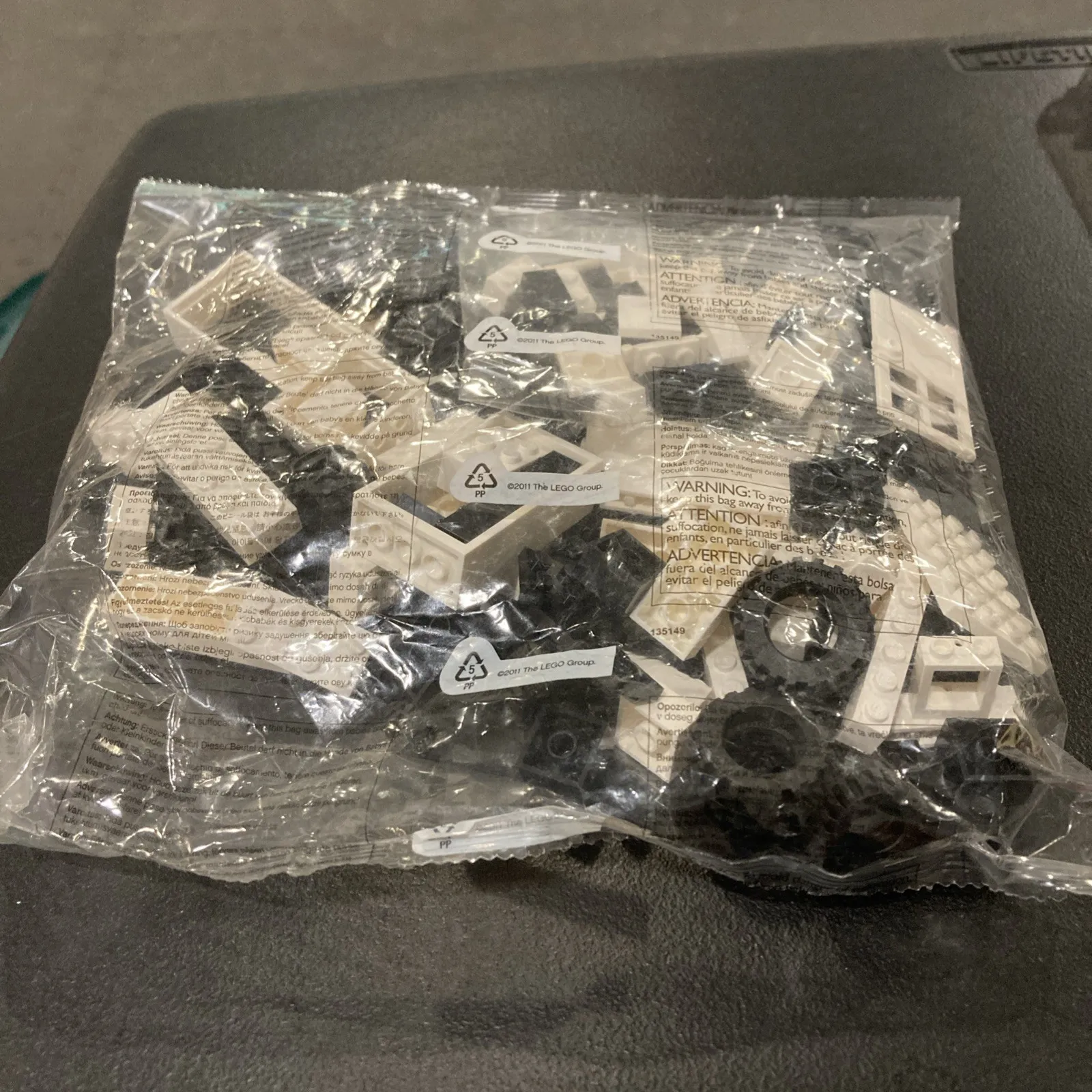 2011 THE LEGO GROUP BAG OF LEGOS #? Wheels Doors Lot 1 Mystery White Black Brick