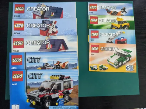 lego manual lot - Including Creator City Marvel